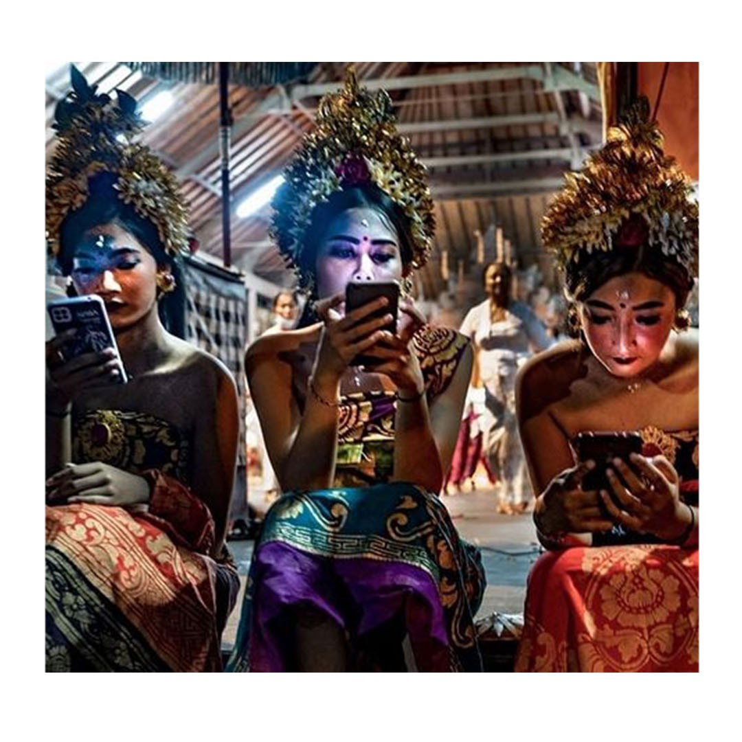 Tumpek Krulut is more or less the celebration of sound/music. The women of Batuan, young and old performed this solemn Rejang accompanied by gamelan. These young girls, who just done their dance, going back right to their phones.

Image and text by @riohelmi

#theyakmagazine #riohelmi #bali #cultureinbali #balineseculture #thebalibible #culture #beliefs #ethnography #street #magnumphotos 
#observecollective #creativeimagemagazine #apfmagazine #life_is_street #indostreetproject #hcsc_street #streetscenesmag #collectivelycreate #eyeshotmag #strtphoto #spjstreets #streetphotography #streetphotographynow #nikon #fujifilm